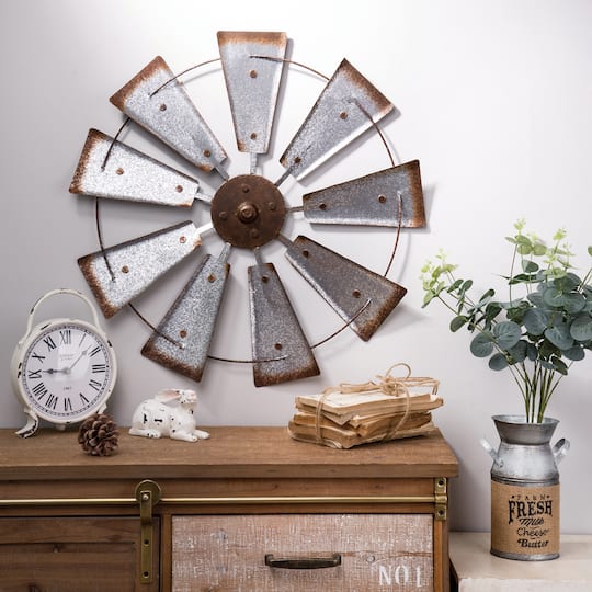 Glitzhome® 22" Farmhouse Metal Galvanized Wind Spinner Wall Décor